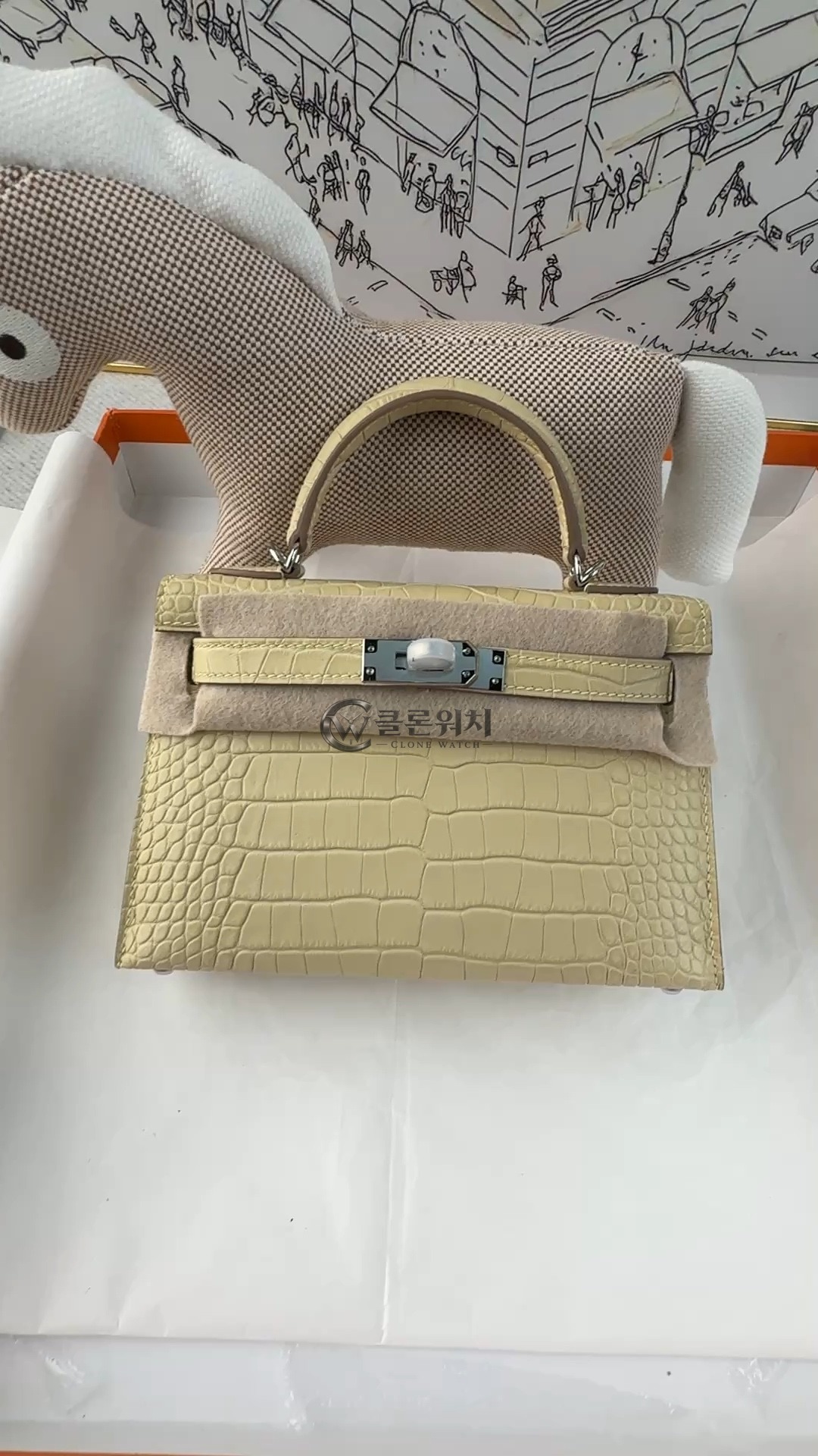 Fully Handcrafted Hermes Mini Kelly Second Generation Vanilla Crocodile Leather Palladium Hardware