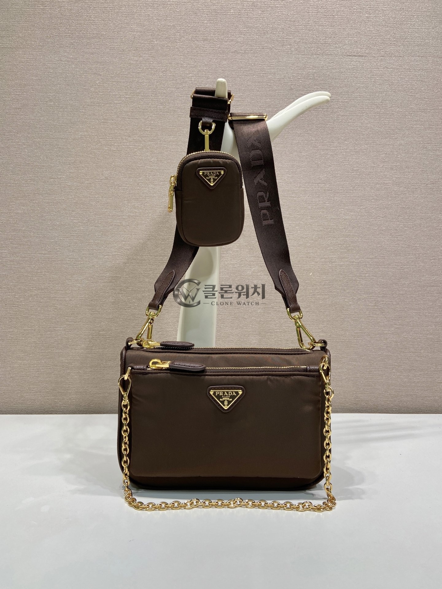 프라다 리나일론 및 사피아노 가죽 미니 숄더백 브라운